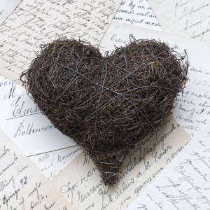 Wire heart on letters